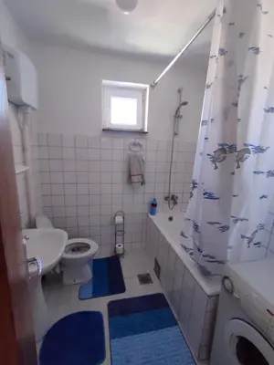 a bathroom with a toilet and a shower curtain at Lepa Kata Centar in Podgorica