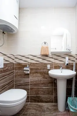 a bathroom with a toilet and a sink at Apartments Blanco in Budva