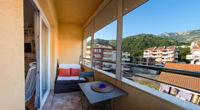 a balcony with a view of a city at Studio Slavica in Budva