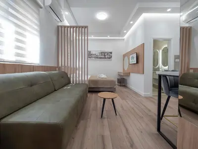 a living room with a couch and a table at Apartments Mary in Budva