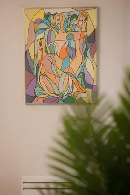 a picture of a stained glass window on a wall at City Nest apartment in Podgorica