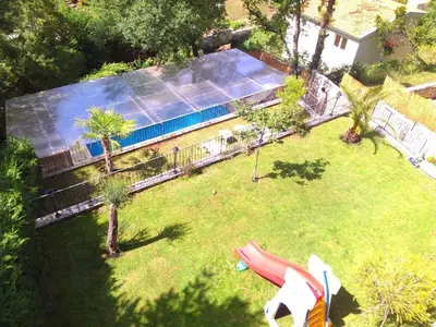 an aerial view of a backyard with a swimming pool at Holiday House Villa Neda in Utjeha