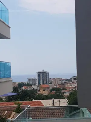 a view of the city from the balcony of a building at Apartment Danijela in Budva
