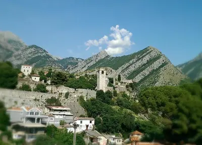 a town on a hill with mountains in the background at Apartment Old Town Stari Bar in Bar