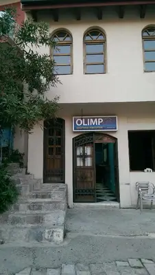 an entrance to a building with a sign on it at Apartment Old Town Stari Bar in Bar