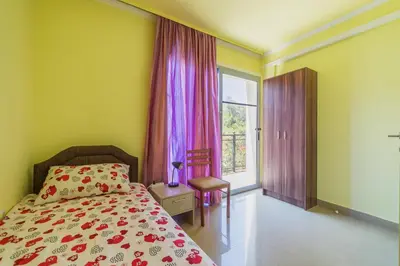 a bedroom with a bed and a window at Villa Tivat in Tivat