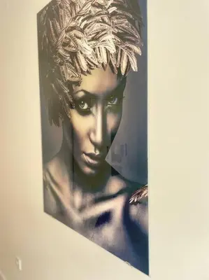 a picture of a woman with areath on a wall at Apartman DolceRosa in Kotor