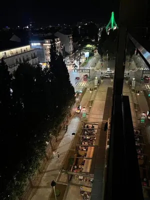 a view of a city at night with a street at Urban Suite Athos in Podgorica