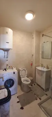 a bathroom with a toilet and a sink at RELAX in Podgorica