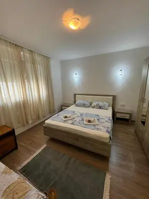 a bedroom with a bed in a room at Berin Apartments in Ulcinj