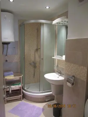 a bathroom with a shower and a sink at Apartment Ozana in Kotor