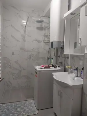 a bathroom with a shower and a sink at Obilex in Podgorica
