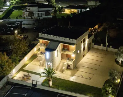 an aerial view of a house at night at Zeta Lux in Mitrovići