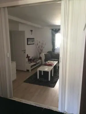 a living room with a couch and a table at Apartments OldTown in Podgorica
