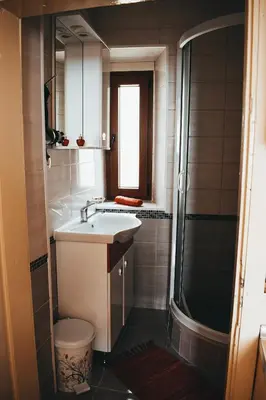 a small bathroom with a sink and a shower at Guest House Alea in Ulcinj