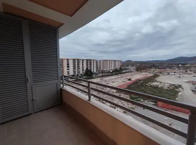 a balcony with a view of a city at Apartman City Kvart Podgorica in Podgorica