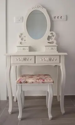 a white dressing table with a mirror and a stool at Pržno Bay in Sveti Stefan