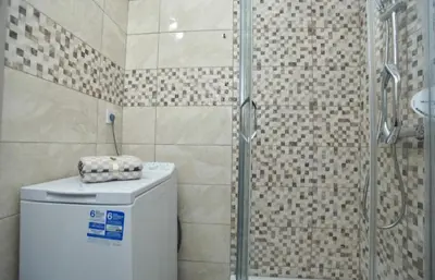 a bathroom with a shower and a toilet and a shower at Budva OLD TOWN 4 apartment in Budva