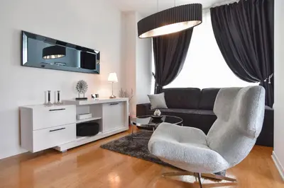 a living room with a couch and a table at PREMIUM Tre canne apart 