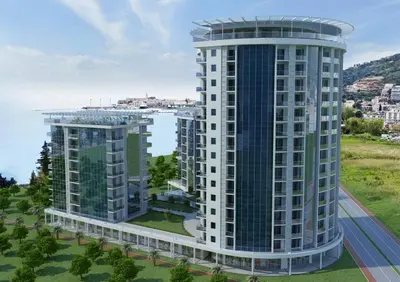 an aerial view of two tall buildings in a city at Apartment with 2 rooms in Tre canne hotel in Budva