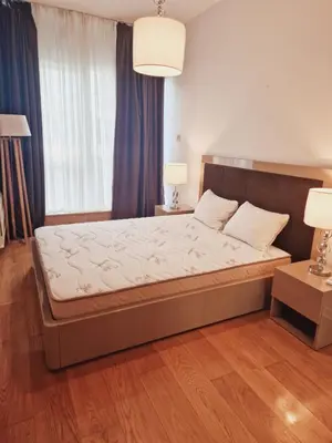 a bedroom with a large bed in a room at Luxury 3 bedroom private apt in beachfront Hotel in Budva