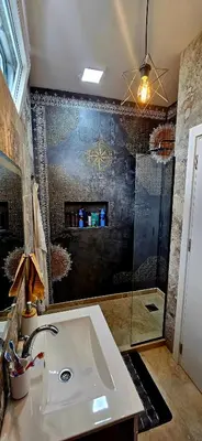 a bathroom with a sink and a shower at Sweet Sea Villa in Utjeha