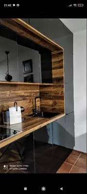 a kitchen with a sink and a counter top at Budva apartman Haustor in Budva