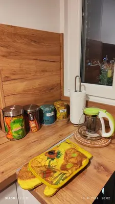 a wooden counter top with various food items on it at Vincent Van Gogh in Podgorica