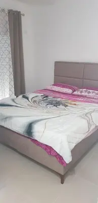 a bed in a room with at Vila Kajevic in Ulcinj