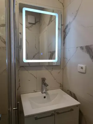 a bathroom with a sink and a mirror at Digital Nomads Camp in Bar, Susanj