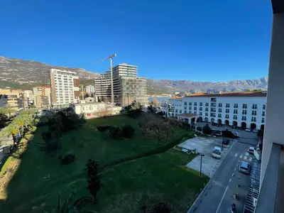 a view of a city with buildings and a park at Lux apartment Komel in Budva