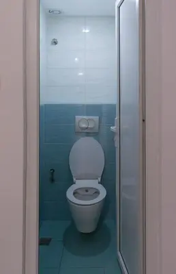 a bathroom with a toilet and a glass shower at Sneza in Podgorica
