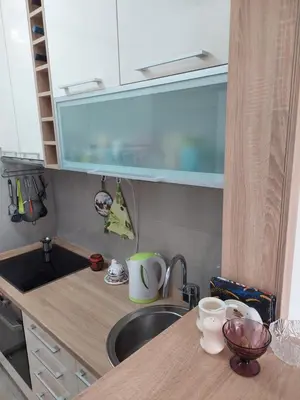 a kitchen with a sink and a counter top at Nice apartment near Old Town and sea in Budva