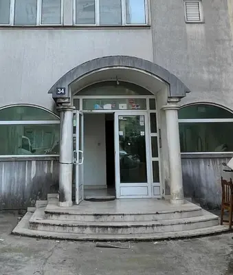 an entrance to a building with a door and stairs at AvR Street Budva in Budva