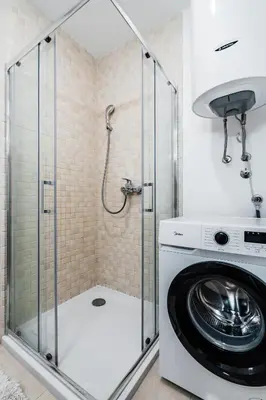 a washer and dryer in a bathroom at Status-M Apartments 103 in Becici