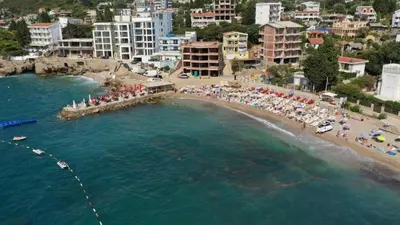 an aerial view of a beach with a crowd of people at Buskovic Bella Vista in Dobra Voda