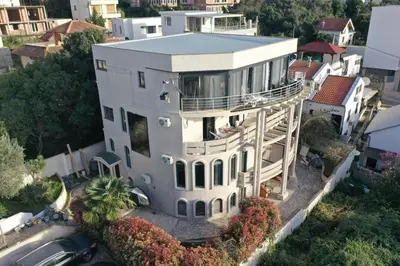 an aerial view of a large white house at Villa Glamour in Utjeha