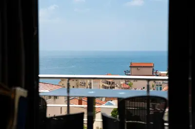 a view of the ocean from a balcony at Villa Glamour in Utjeha