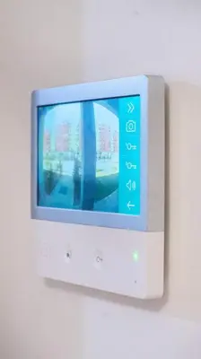a tv on a wall with a video game controller at Ana Lux Master apartament in Podgorica