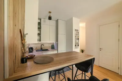 a kitchen with a wooden counter top in a room at The Dream Getaway SkyLine by DeVasco in Becici