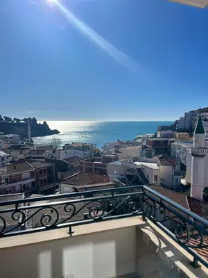 a view of the ocean from a balcony at Hotel NOBEL Ulcinj in Ulcinj