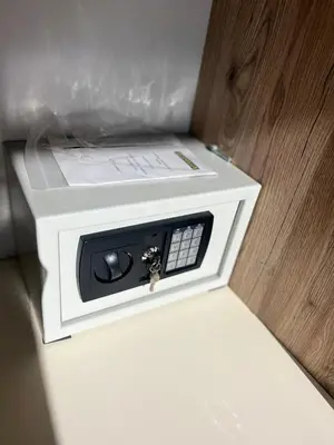 a microwave oven sitting on top of a counter at Hotel NOBEL Ulcinj in Ulcinj