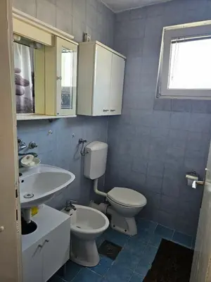 a bathroom with a toilet and a sink at Appartment Belavista in Bar