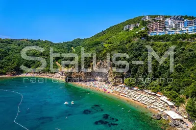 an aerial view of a beach with the word startm at Status-M Apartments WOW in Budva
