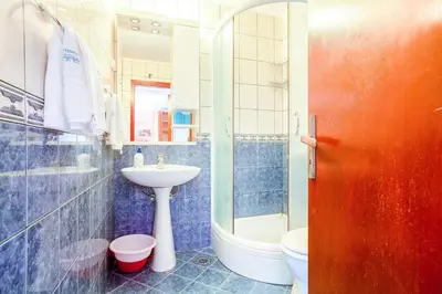 a bathroom with a sink and a toilet at Apartment More - Konoba More in Pržno