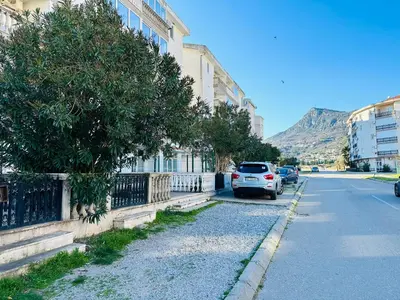 a car parked on the side of a street at SweetHome in Sutomore