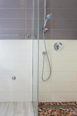 a shower with a shower head in a bathroom at Tophill Altezza 9 best view and pool in Budva