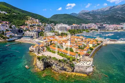 an aerial view of a city on the water at Status-M Apartments Franca sea view in Budva