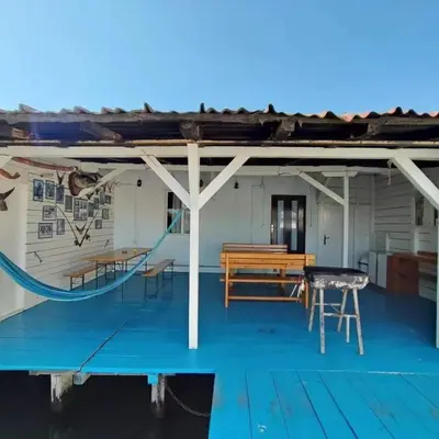 a deck with a bench and a slide on a boat at Kucica Truma in Ulcinj