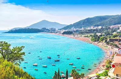 a view of a beach with boats in the water at Stone Villa Guesthouse in Budva